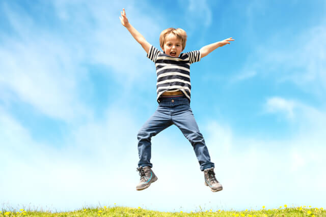 child jumping in the air