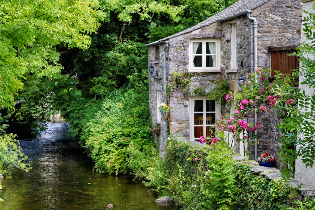 We live in England's 'prettiest village' where hordes of tourists peer into  windows & have picnics in our gardens