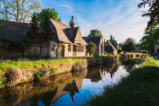 We live in England's 'prettiest village' where hordes of tourists peer into  windows & have picnics in our gardens