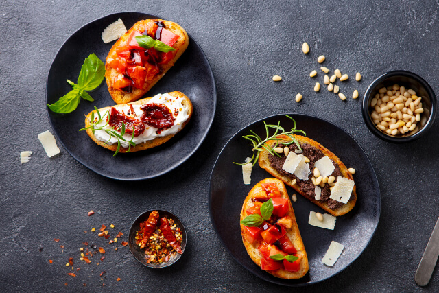 Bruschetta with tomatoes, cheese and olive tapenade