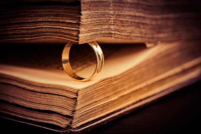 gold ring inside book