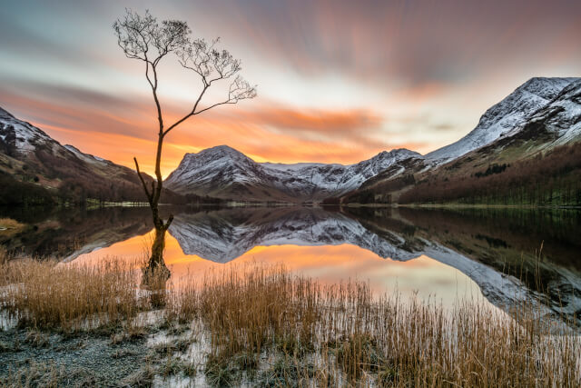Dramatic Orange Sunrise Over Snow Covered Mountains, Lake District 
