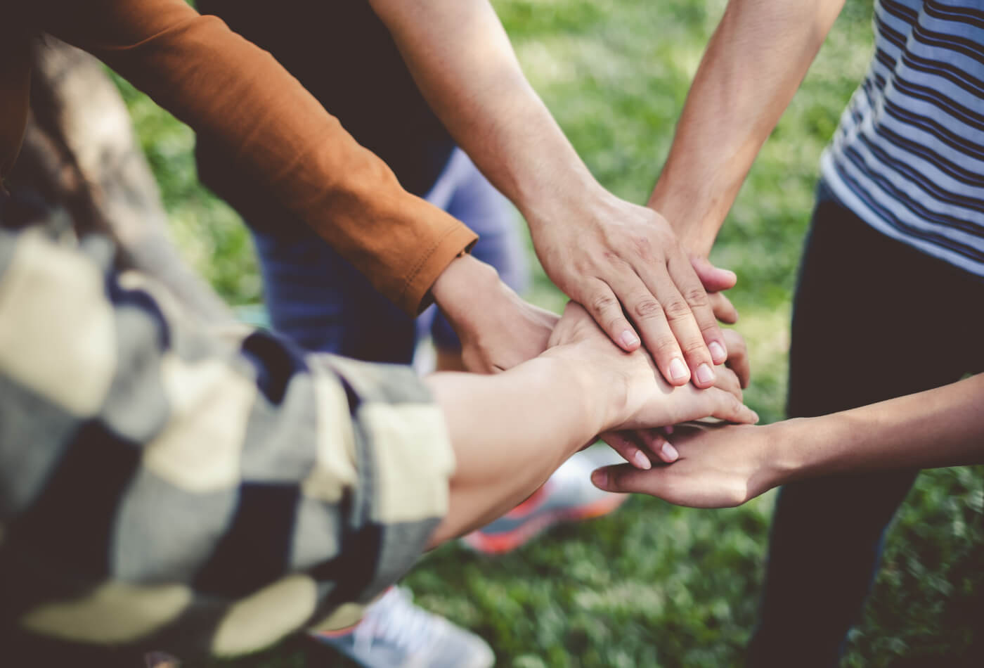 Stacking hands for togetherness