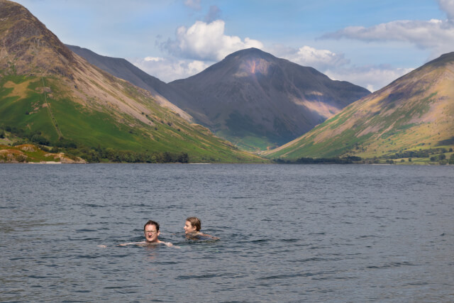 Couple wild swimming in the Lake District.