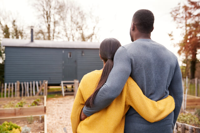 Couple arriving at their holiday home