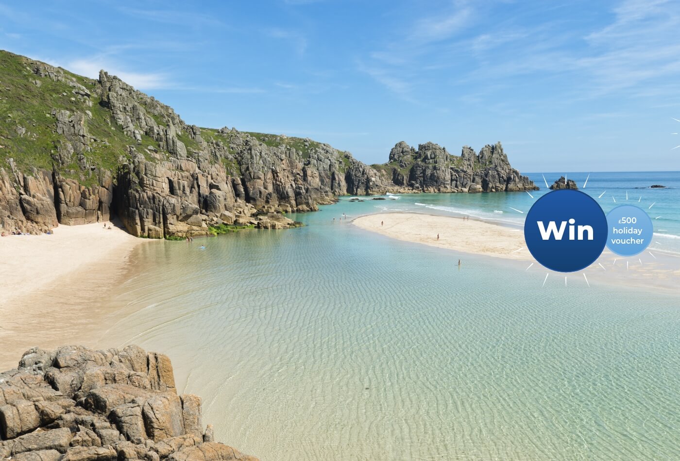 Feature image of beach with 'win' and '£500 holiday voucher' roundels