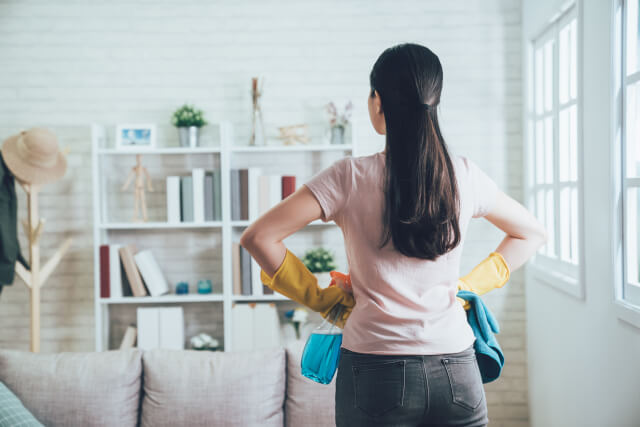 woman getting ready to clean home