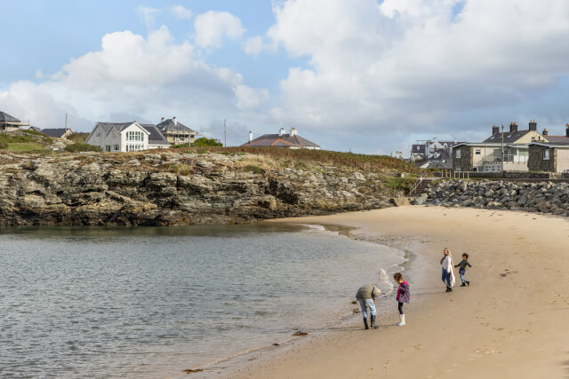 Family enjoying Trearddur Bay Beach