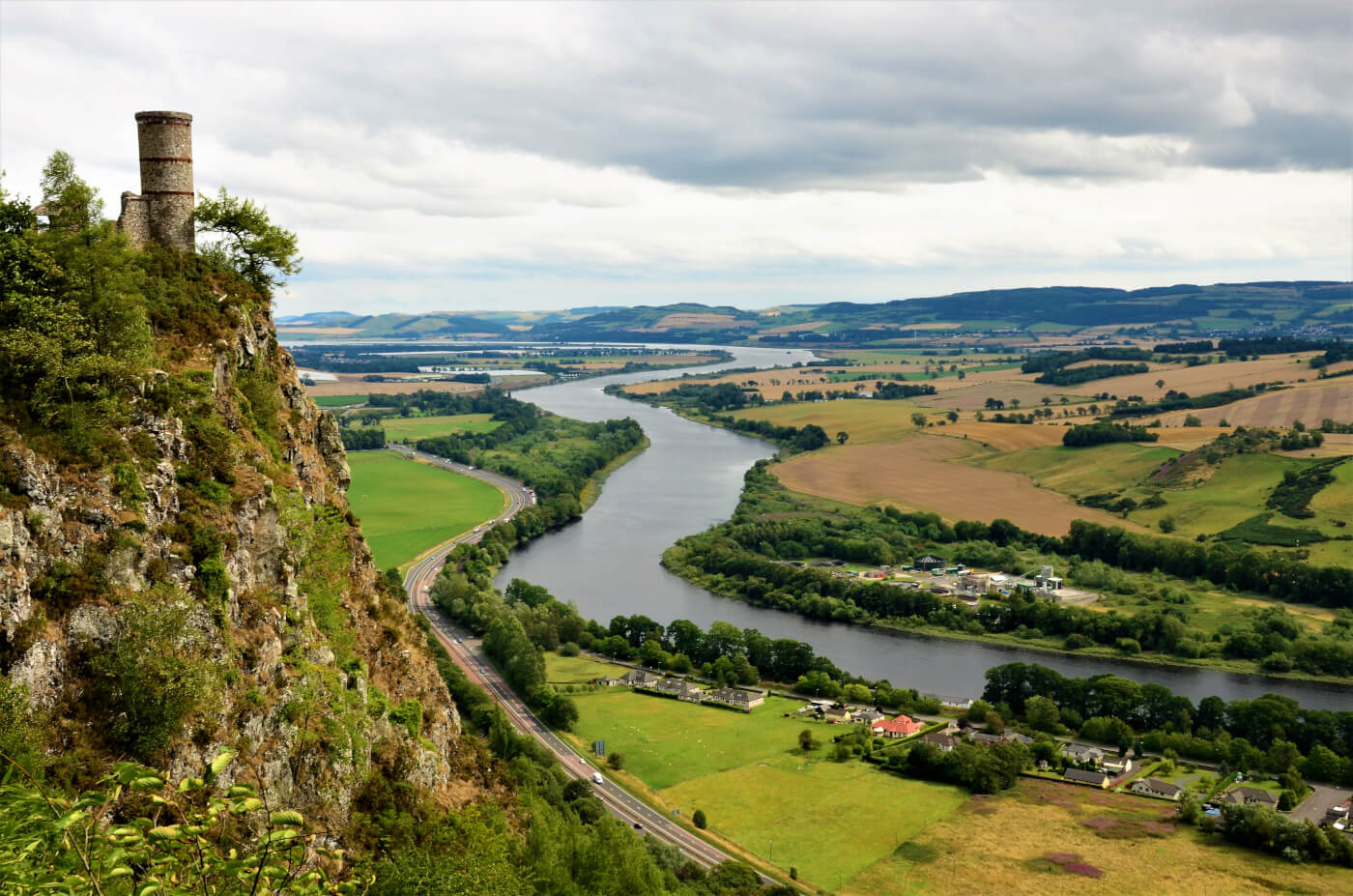The view of a river and surrounding countryside from Kinoull Hill in Scotland