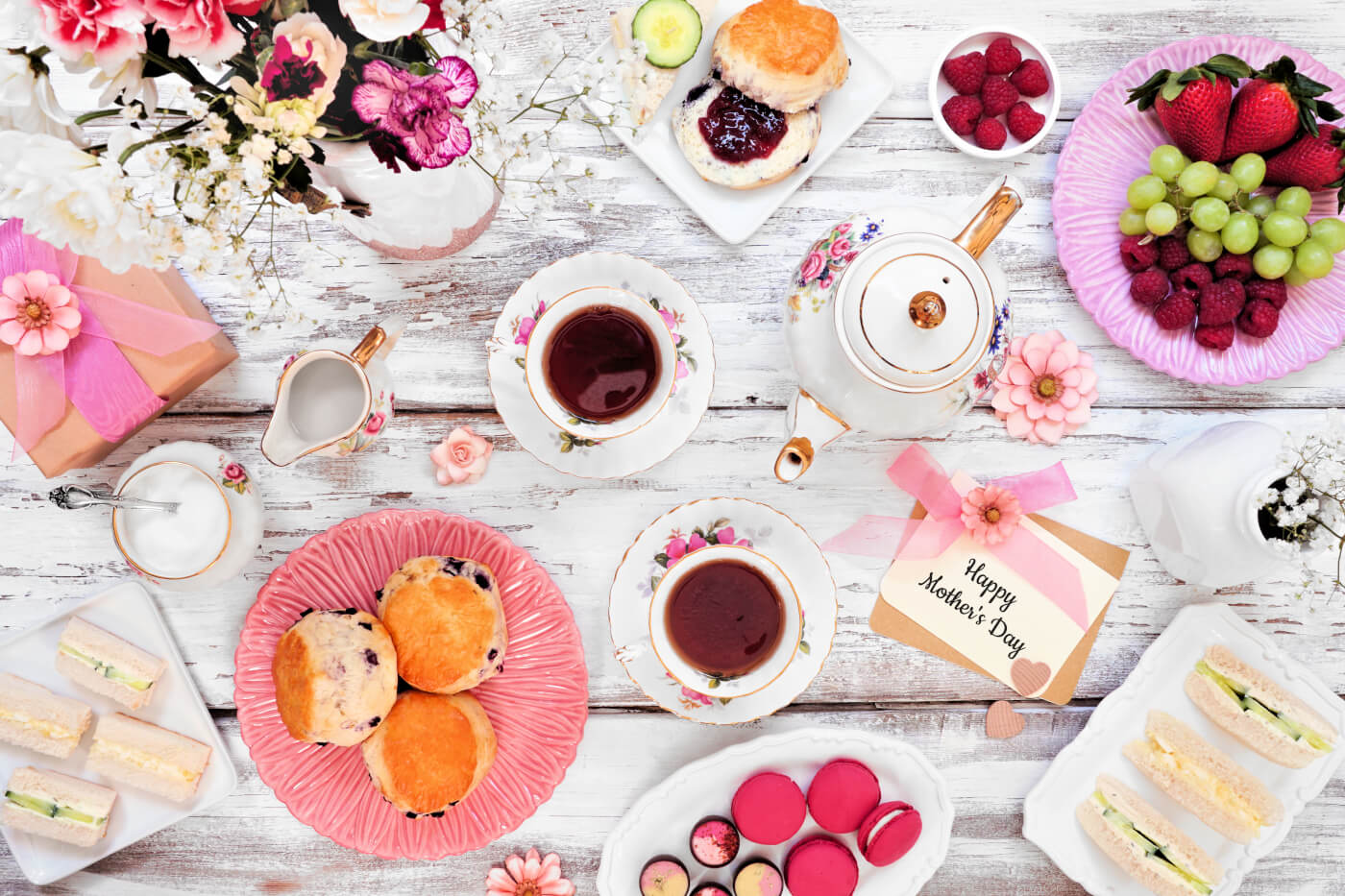 An ariel view of tea cake and scones on a table at afternoon tea