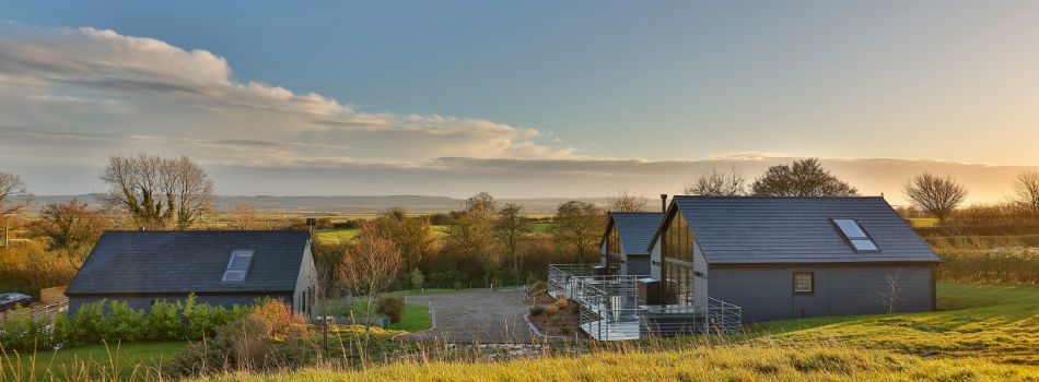 Hideout lodges from outside hill