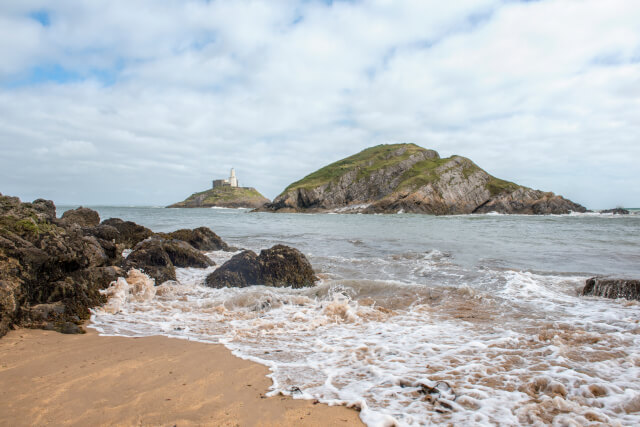 Views of Mumbles Lighthouse from Mumbles Beach, Gower