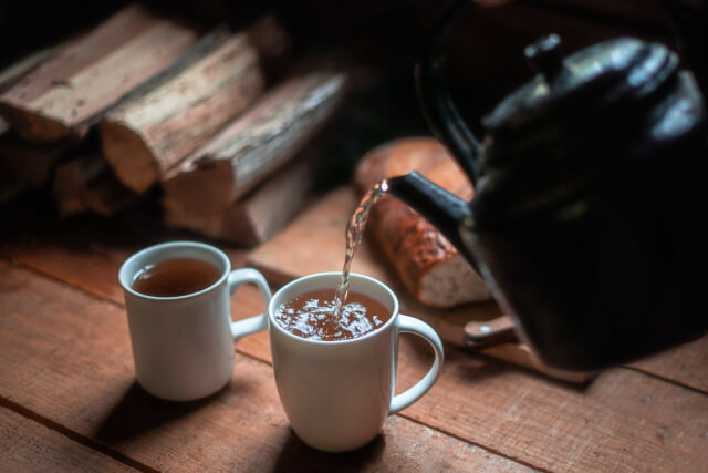 pouring cup of tea