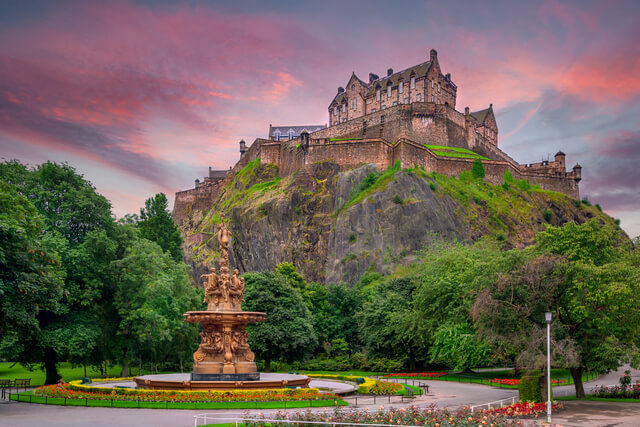 A view of Edinburgh Castle as the sun sets