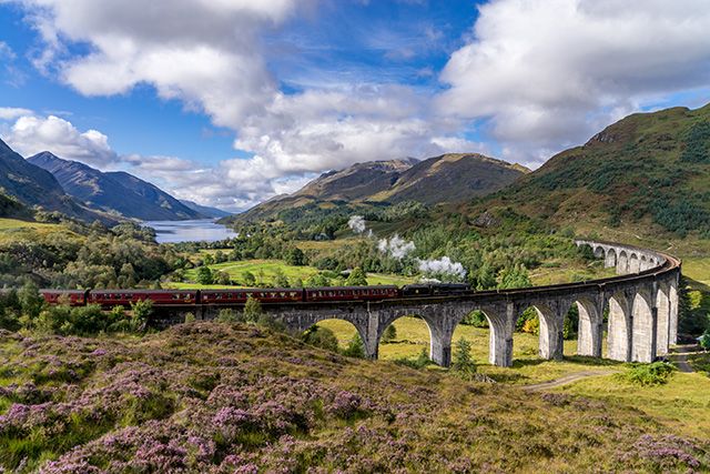 Train going along the Glenfinnan Viaduct