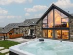 Exterior of Y Côr and the hot tub.