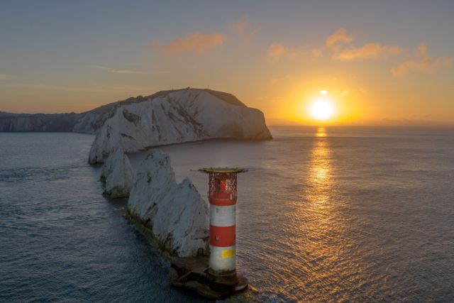 The Needles lighthouse at sunrise on the Isle of Wight