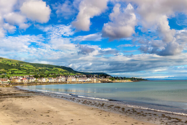 Looking north from Carnlough Beach, with the village of Carnlough visible in the background