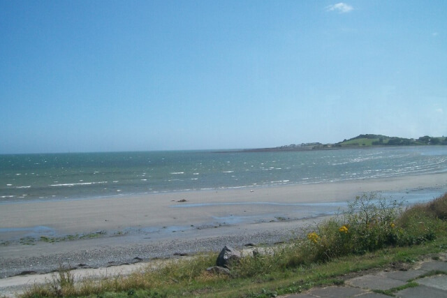 Looking southwards out to sea from the shore of Cloughey Bay Beach, County Down