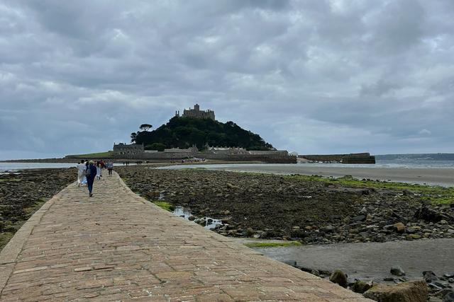 People walking across the causeway to St Michael's Mount