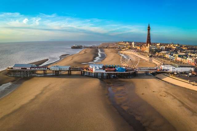 Blackpool waterfront and wide stretch of sand.