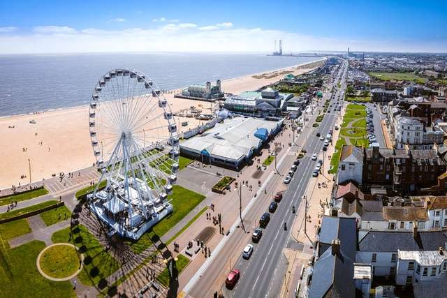 Great Yarmouth waterfront with big wheel attraction.