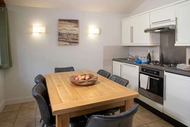 Kitchen and dining area in Forest of Dean Woodland - Golden Oak.