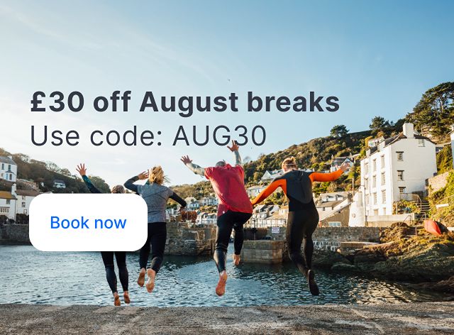 £30 off August breaks banner with four ladies jumping into water.