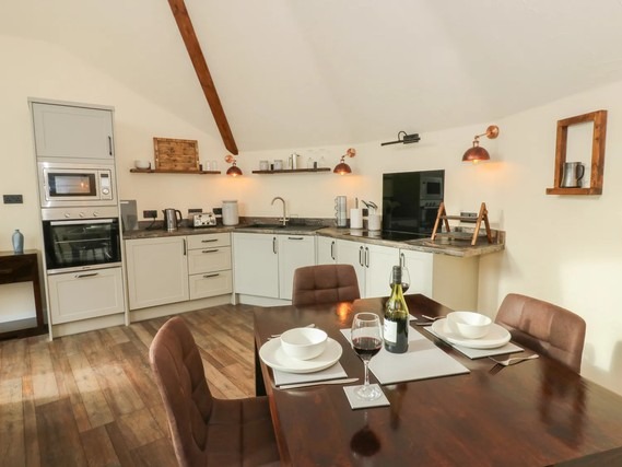 Open-plan living area at Ty Crwn - The Roundhouse.