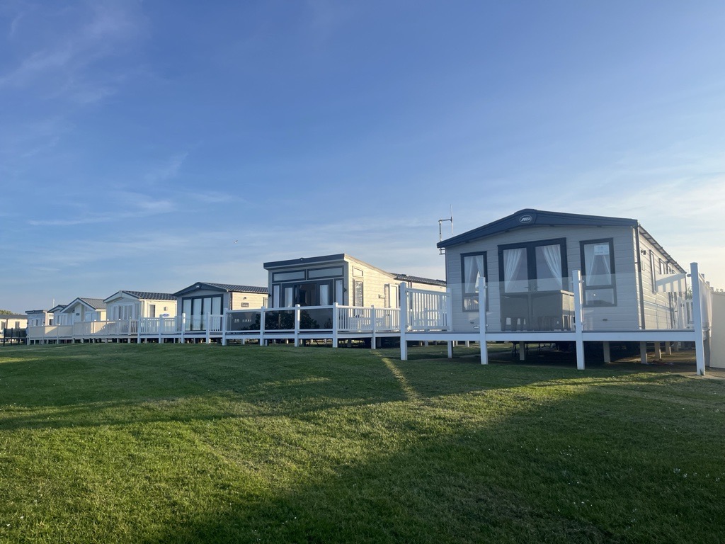 Row of beach front caravans at Primrose Valley Holiday Park in Filey.