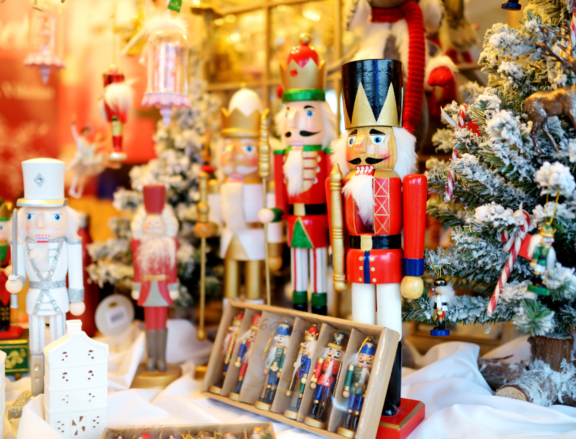 Traditional wooden nutcrackers at a festive Christmas market.