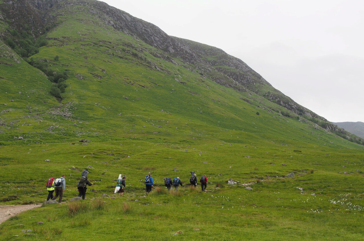 Walkers attempting Ben Nevis on a cloudy day