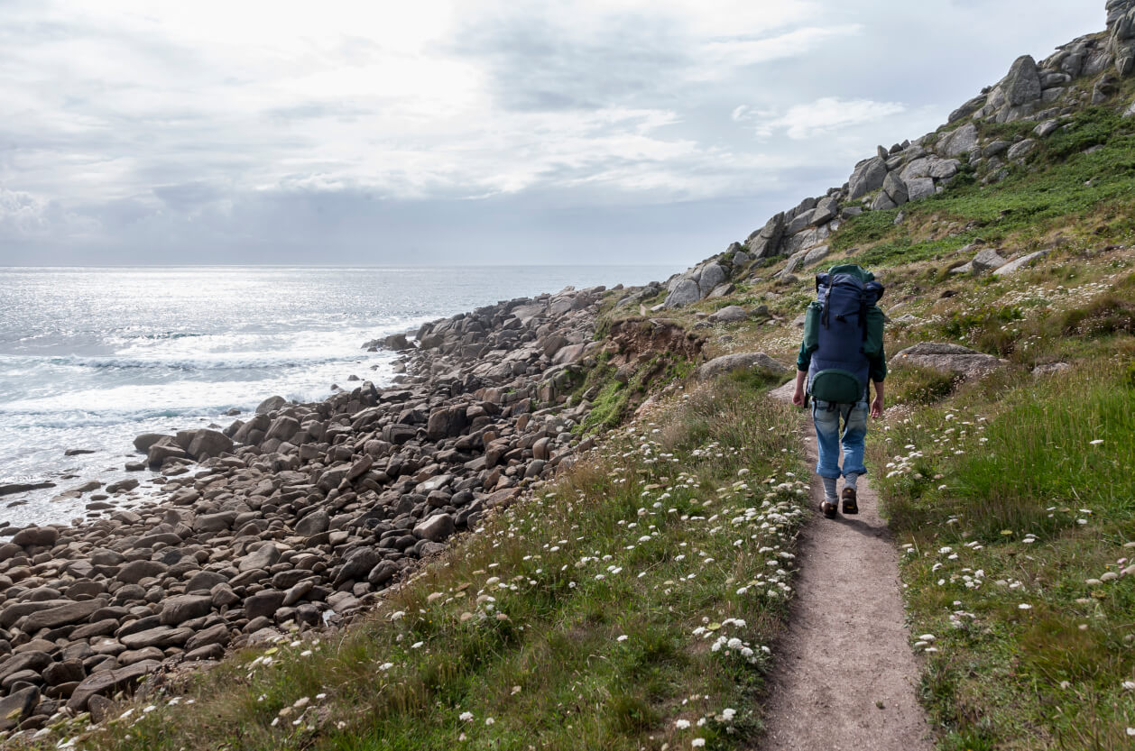 A person hiking in Cornwall