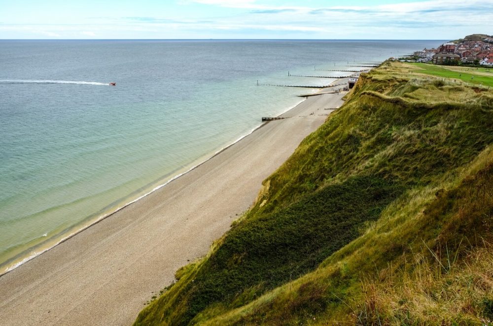 A view from the cliffs of the sea and sand on the coast of Sheringham