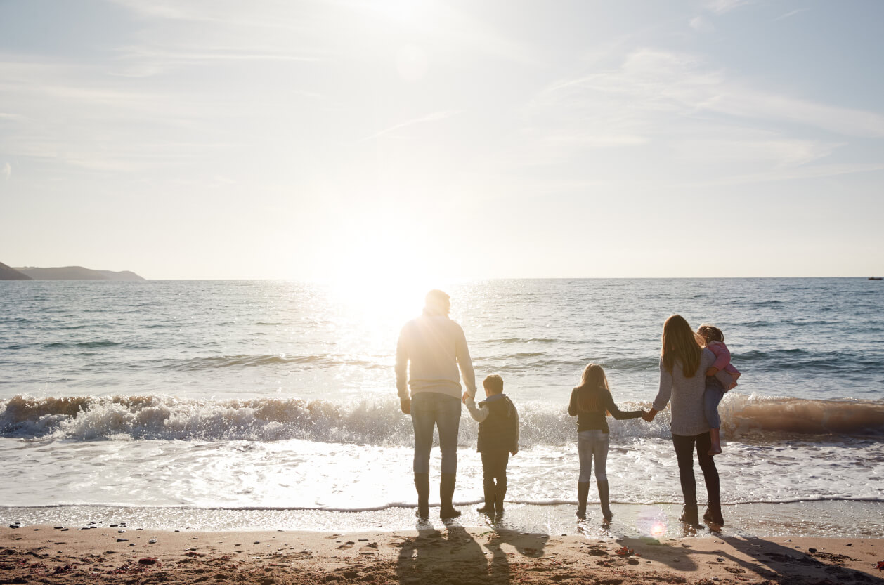 Family of five at the beach