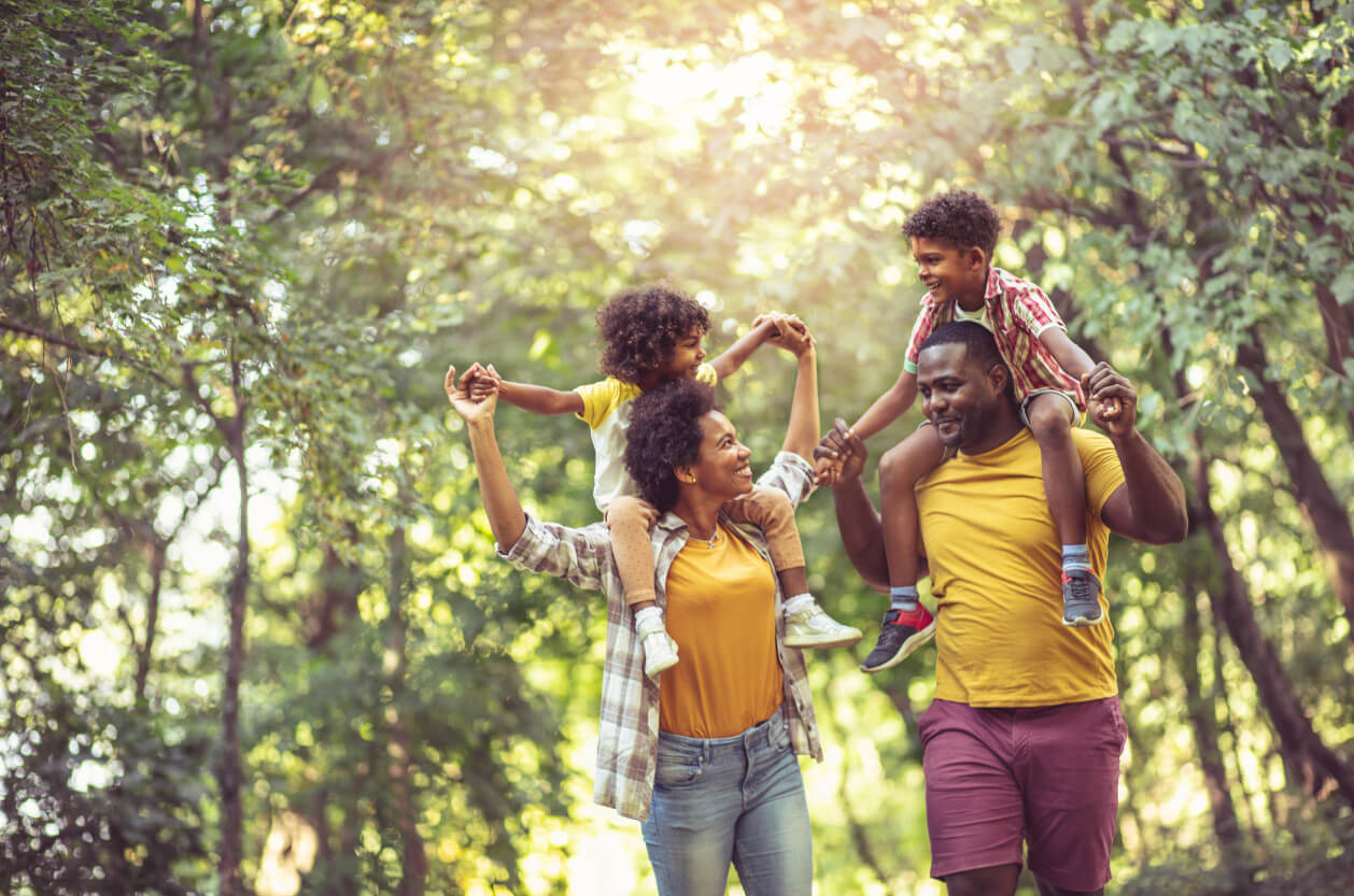 Family walking through a park