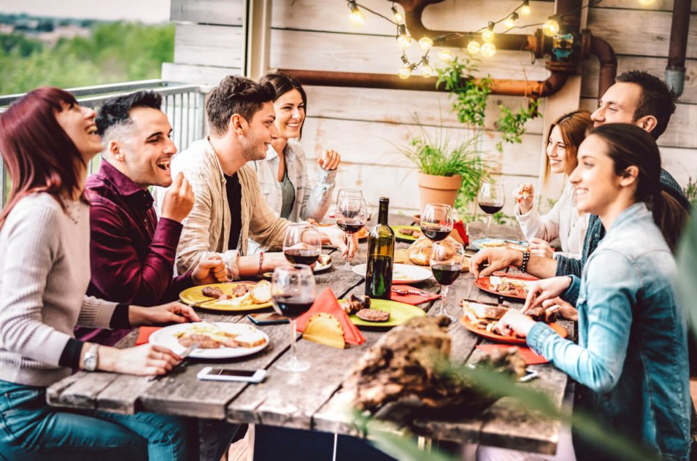 Group of friends dining outdoors