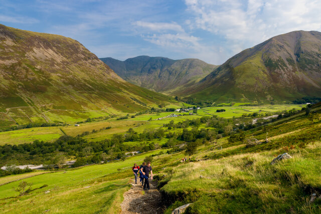 Group of people on a walking trail that leads to Scafell Pike