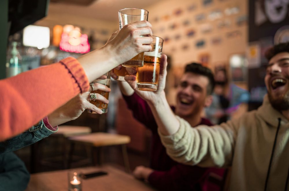 Friends at pub with beer