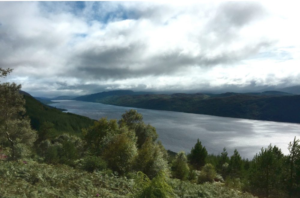View of Loch Ness under cloudy skies from high up on the Great Glen Way, near Drumnadrochit, Scotland.