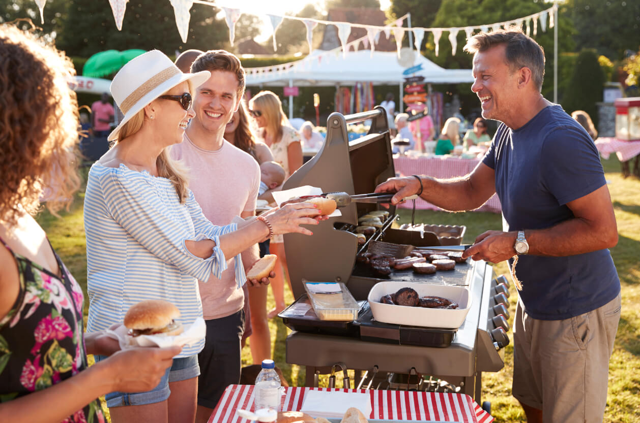 People enjoying barbecued food at food festival