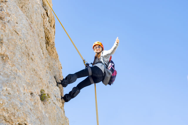Woman abseiling