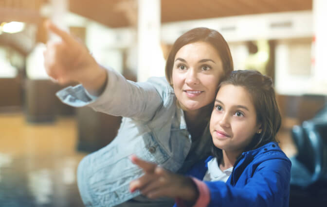 Woman and girl in museum