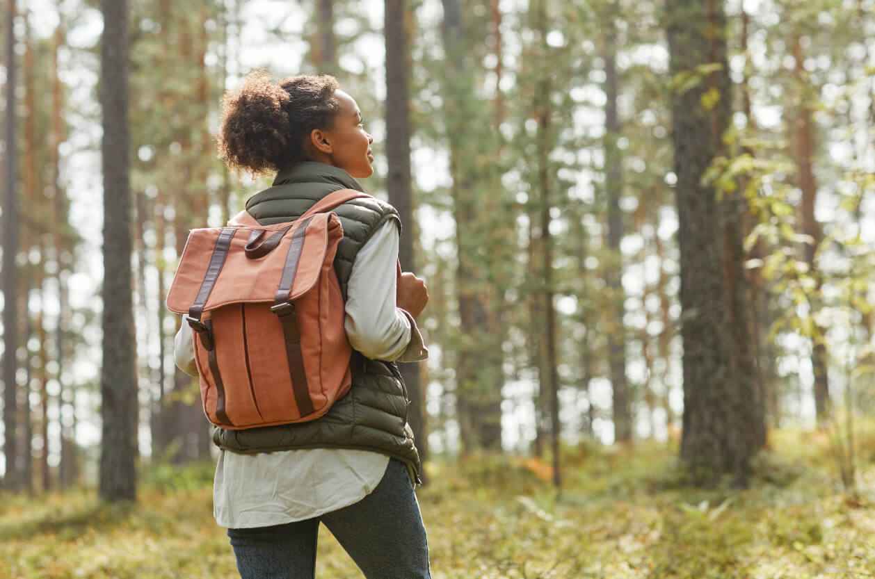 Woman hiking in forest