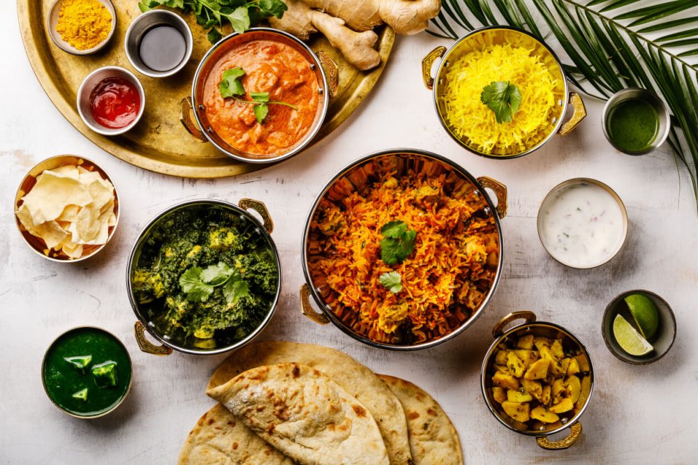 an indian meal with a variety of dishes