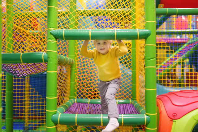 child in indoor play area