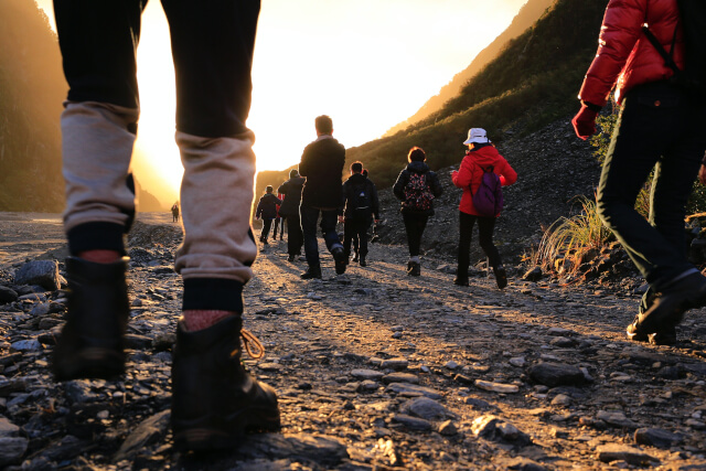 close up of hikers walking