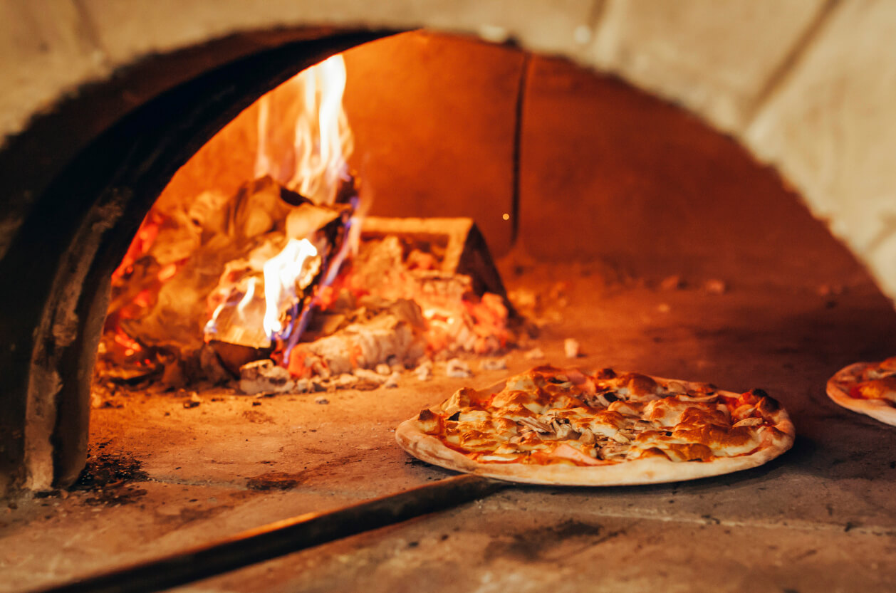 pizza in wood-fired oven