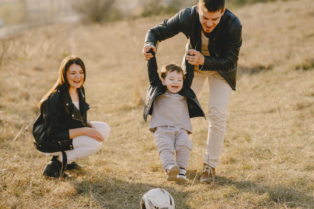 family of three having fun