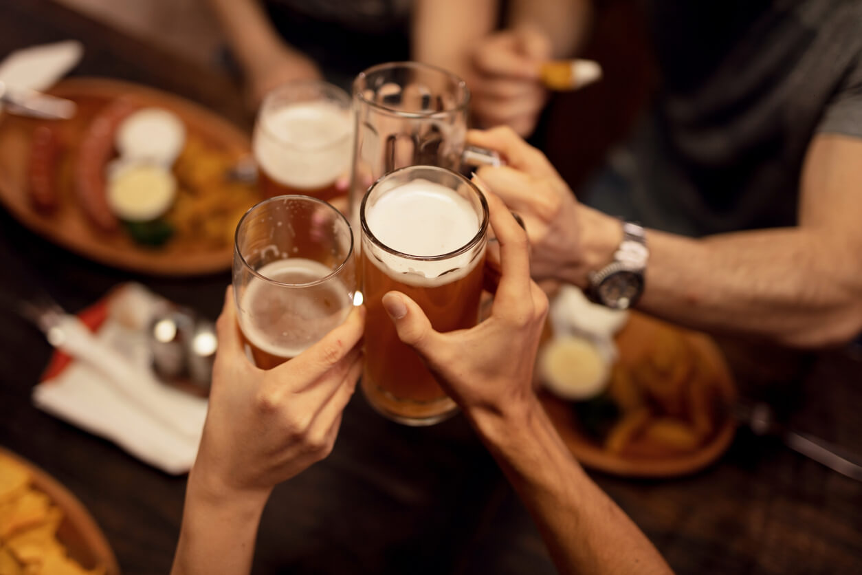 friends toasting with beer